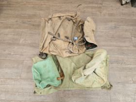 A military backpack together with two canvas sinks and a water carrier (no bases)