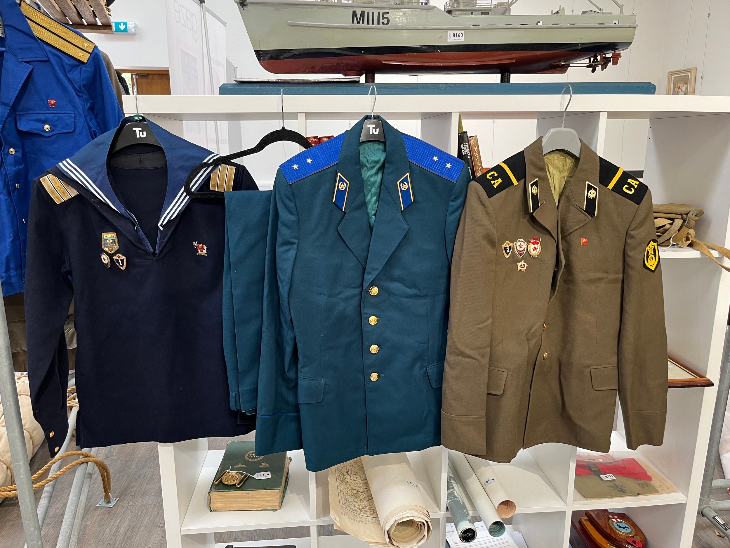 A quantity of various Russian USSR Soviet uniform including Air Force, together with a US jacket and