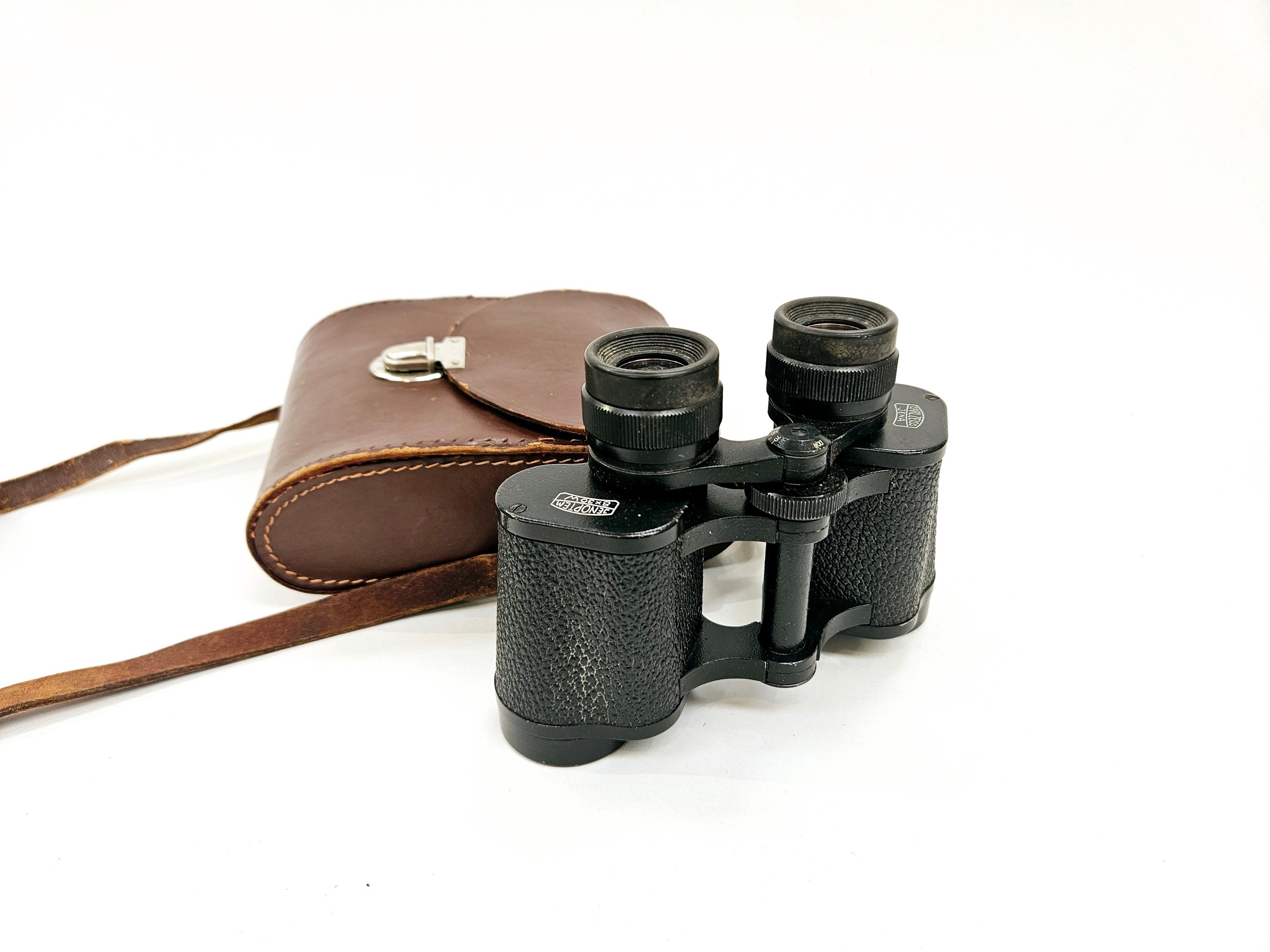 A pair of Carl Zeiss Jenoptem 8x30W binoculars with case