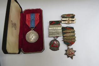 An Imperial Service Medal, cased with framed award document and various driving medals to Rupert