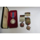 An Imperial Service Medal, cased with framed award document and various driving medals to Rupert