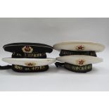 Four USSR Russian Soviet Navy sailor's hats, three white with black tally, the other black with