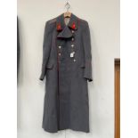 A USSR Russian Soviet army overcoat, grey with red piping and insignia