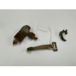 A relic Wellington bomber crash find valve together with two hook fastenings, provenance Gt