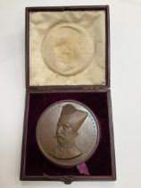 A bronze medal commemorating the Visit of the Shah of Persia to the City of London, 1873, by A.B.