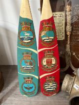 Two Fleet Air Arm ceremonial oars painted with the crests of 810, 819, 849, 801 and 845 squadrons