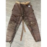 A WWII pair of Irvin sheepskin leggings, the straps marked SGT. E. WILLIAMSON