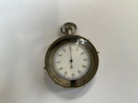 A WWI era German stopwatch thought to be for U-Boat torpedo timing, enamelled face with numbered