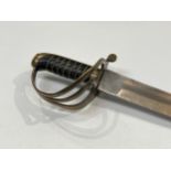 A 19th Century sabre, the brass three bar hilt with brass wired hardwood grip joining a single