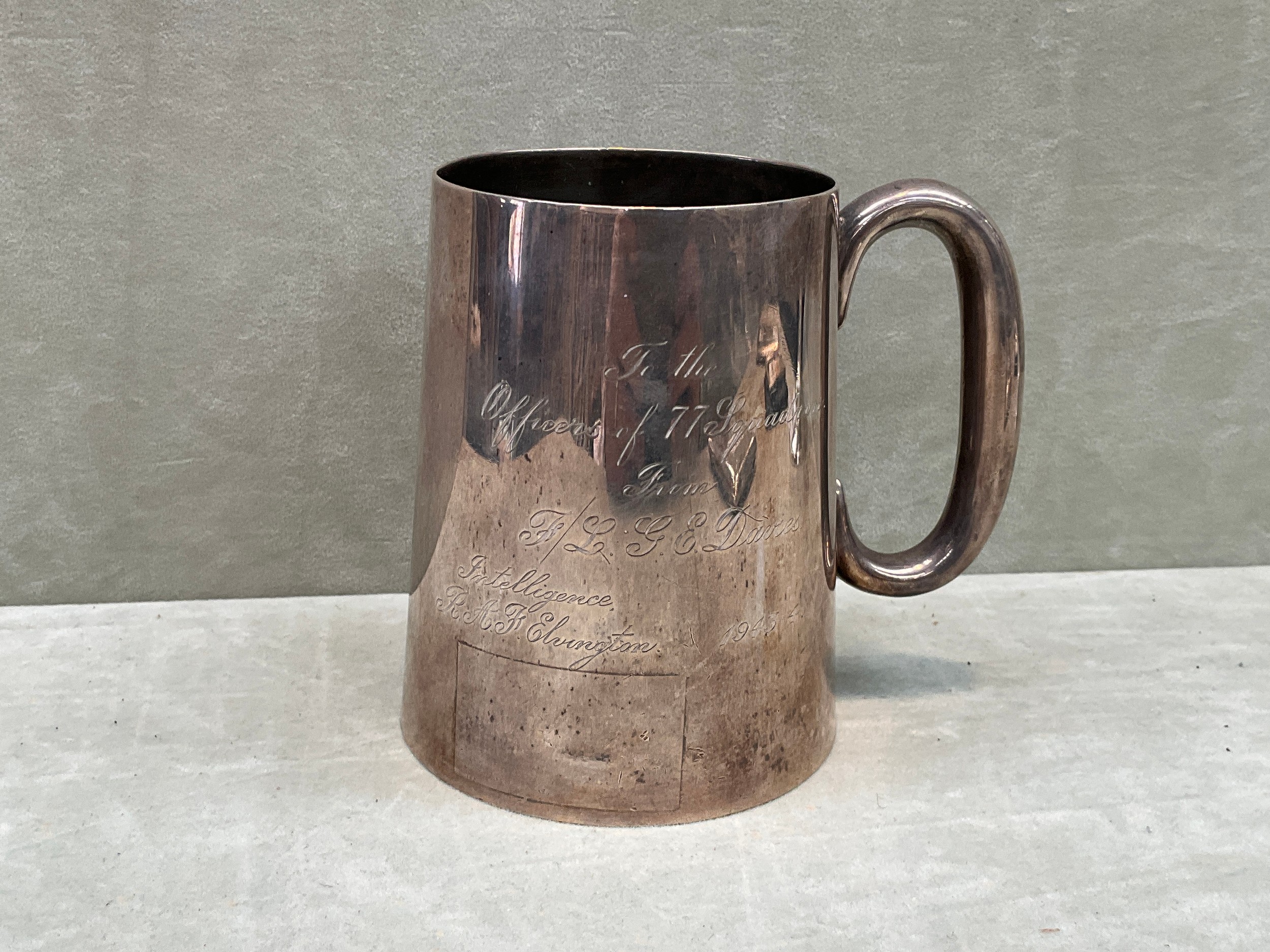 A James Dixon & Sons Ltd. silver tankard inscribed "To The Officers of 77 Squadron from Ft./L. G.