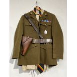 A post-war British Army Service Dress uniform with Norfolk Regiment insignia, together with an