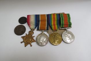 A WWI and WWII medal group of four consisting of 1915 star trio named to 8086 CPL. W.R. WARREN SUFF.