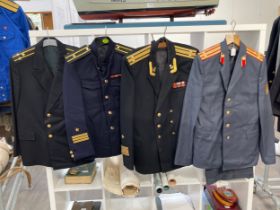 A quantity of Russian USSR Soviet and later uniform including Naval (five jackets, two with