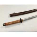 A Japanese katana, ray skin grip wrapped in cloth, iron tsuba with copper foliage, the tang unsigned