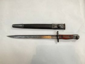 A WWII Indian made Mk. II bayonet with NWR 43 stamp to ricasso, with scabbard