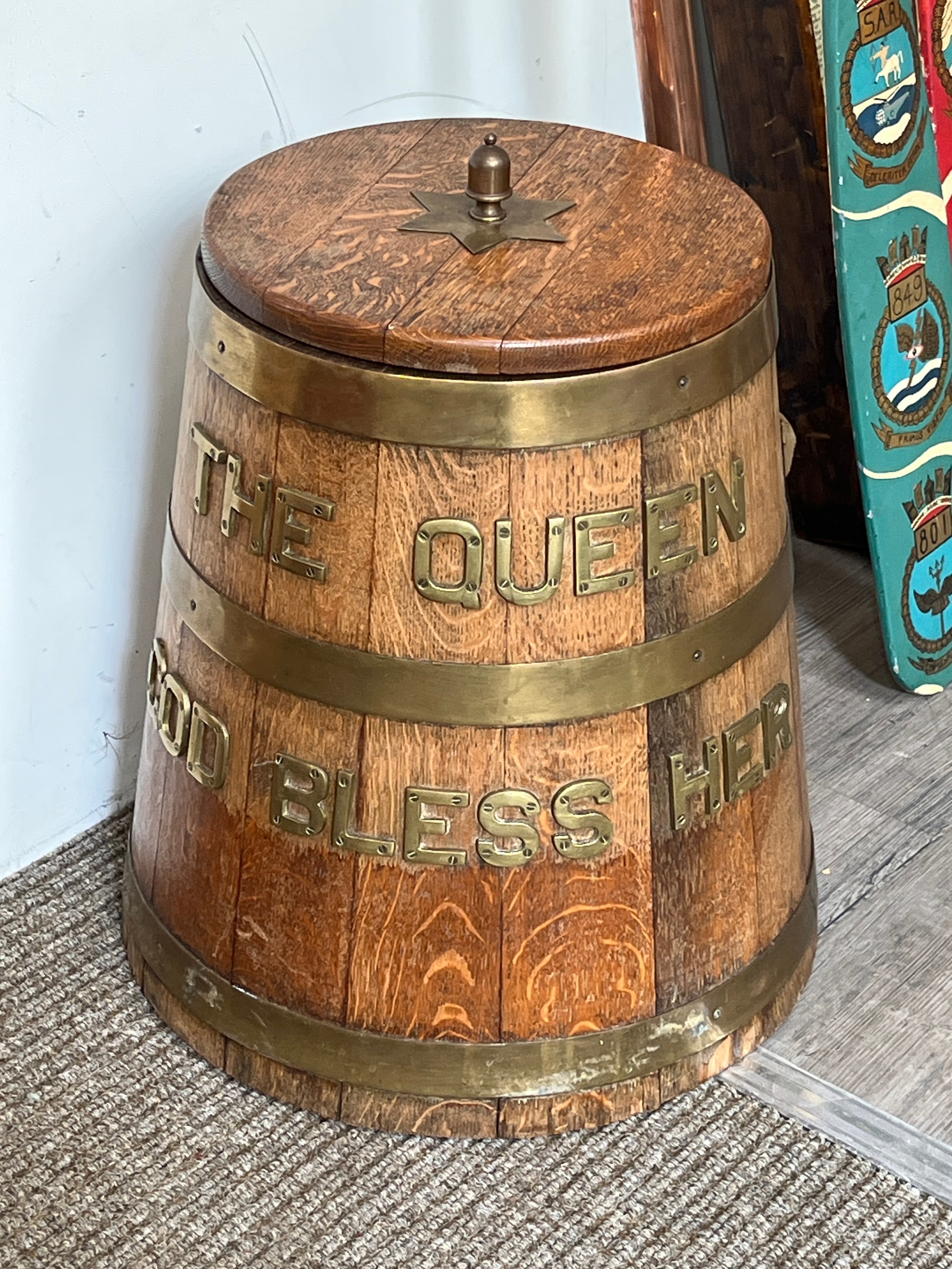 A Royal Navy coopered oak rum tub, brass detail “THE QUEEN GOD BLESS HER”