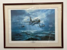A Melvyn Buckley 'Flying Tigers' print of RAF Lightnings, framed and glazed, signed