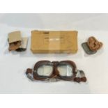 A pair of WWII British Air Ministry Mk. VIII flying goggles together with spare lenses, boxed.