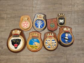 A collection of ship's crests including Marvel and Bulldog