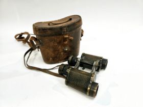 A pair of WWI era Carl Zeiss Telact 8x binoculars, marked with initials H.H.P., together with a