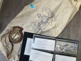 A quantity of Falklands related items including map of Island, first day covers, a kitbag which