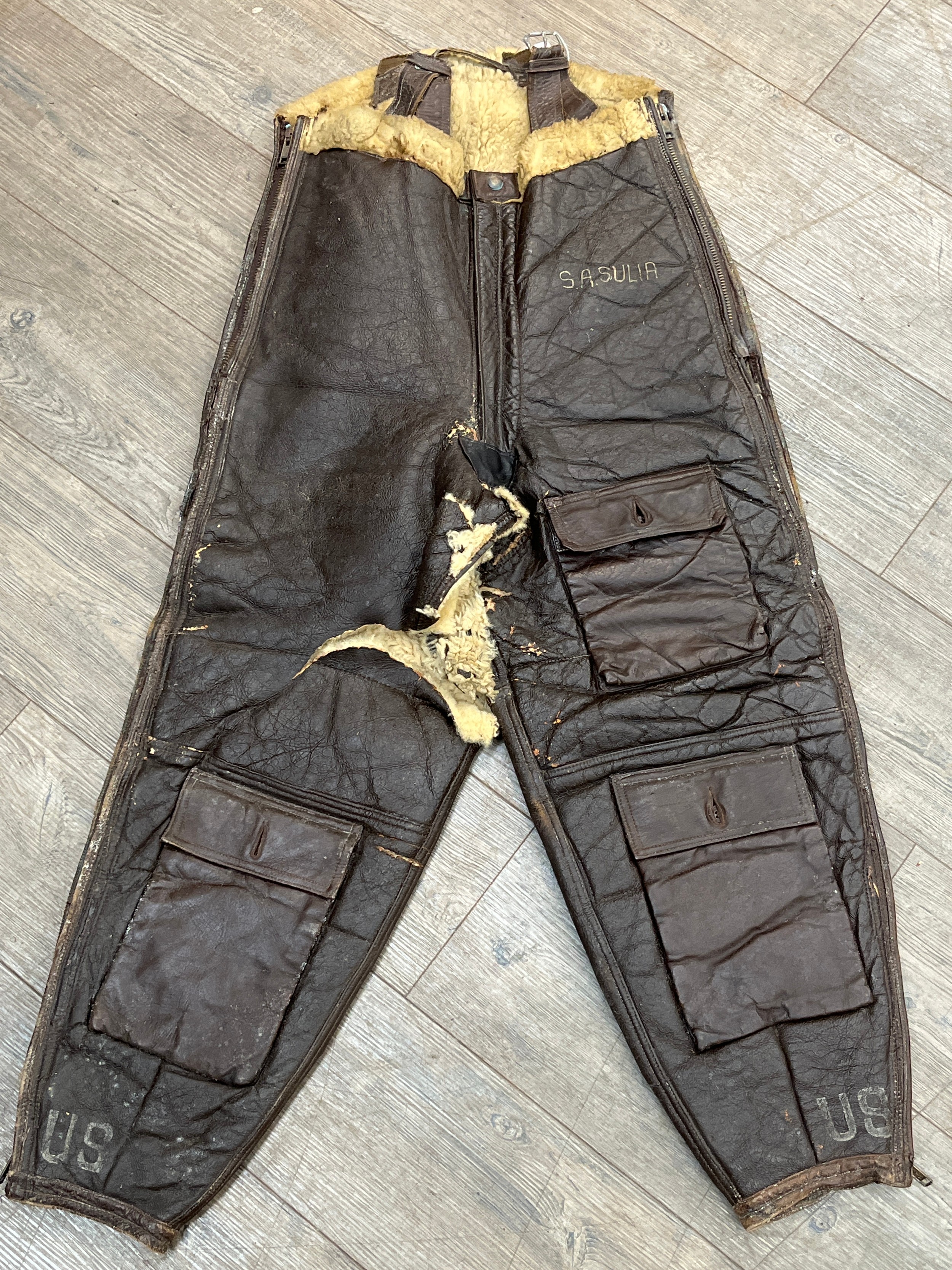 A pair of USAAF A-3 Sheepskin flying trousers marked with the name S A Sulia (Possibly Salvatore