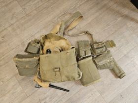 A webbing kit belt including bayonet
