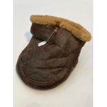 A scarce WWII RAF foot warmer, sheepskin and leather, possibly Irvin