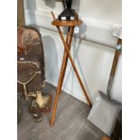 A campaign bamboo effect turned wood oil lamp stand