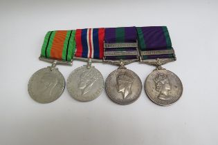 A WWI and later medal group of four consisting of Defence Medal, War Medal, George V General Service