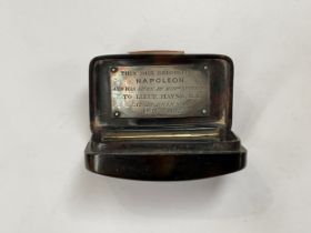 ATTRIBUTED TO NAPOLEON BONAPARTE: An early 19th Century black lacquered snuff box, the lid with