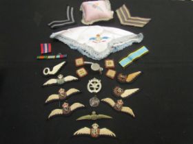 A collection of RAF / Commonwealth badges and insignia including New Zealand, Australia, and Royal