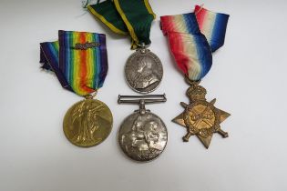 A WWI medal group consisting of 1915 star trio named to 1355 PTE. H.W. BANTICK SUFF. R. and a George