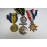 A WWI medal group consisting of 1915 star trio named to 1355 PTE. H.W. BANTICK SUFF. R. and a George