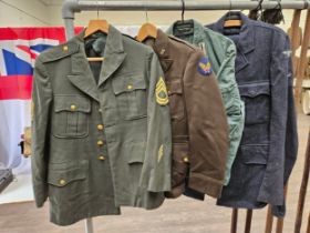 A quantity of military uniform including 1952 RAF Service Dress and two post war US service jackets