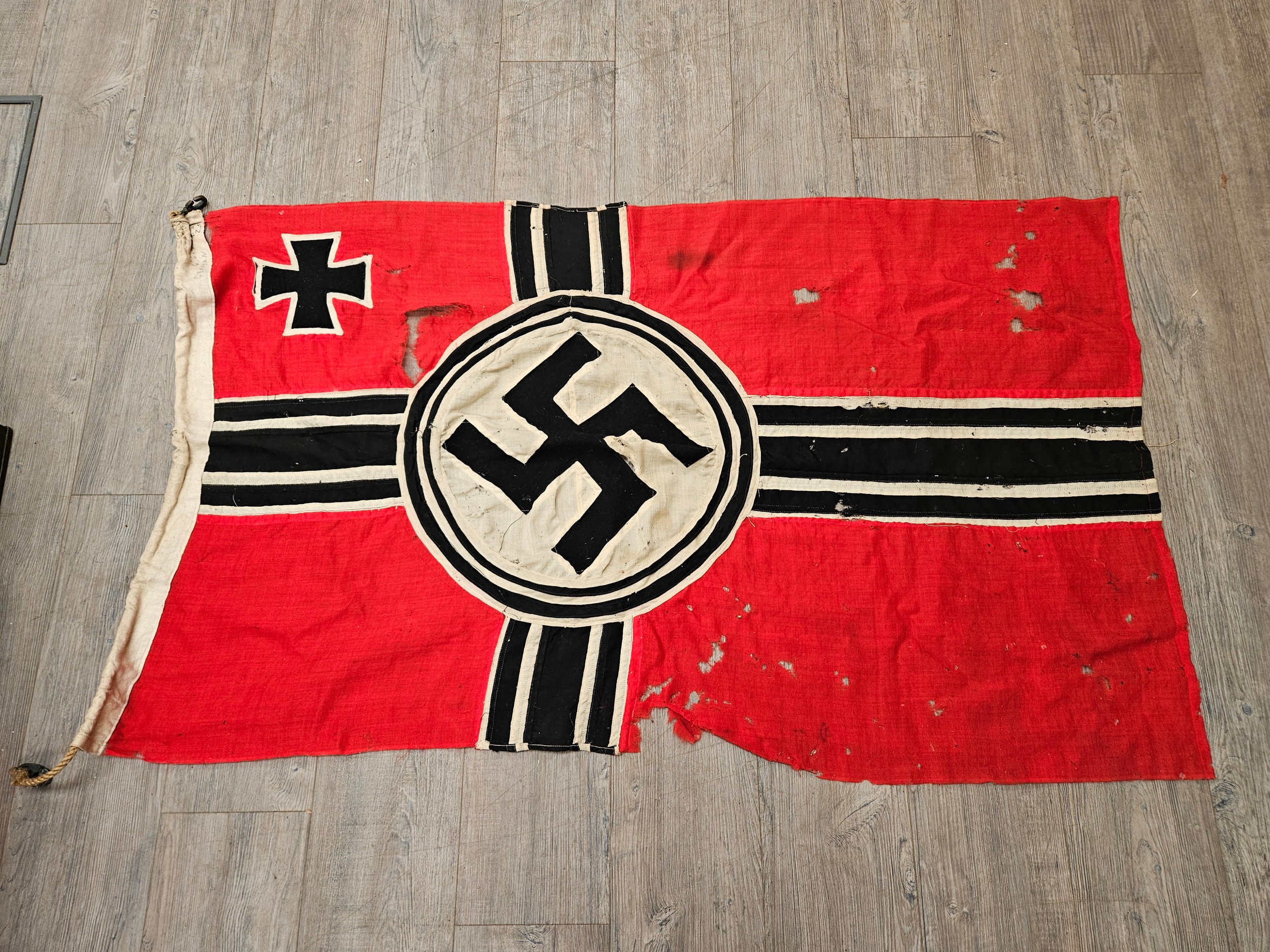 A Third Reich era German Nazi ensign flag, reputedly taken from a U-Boat when they surrendered in