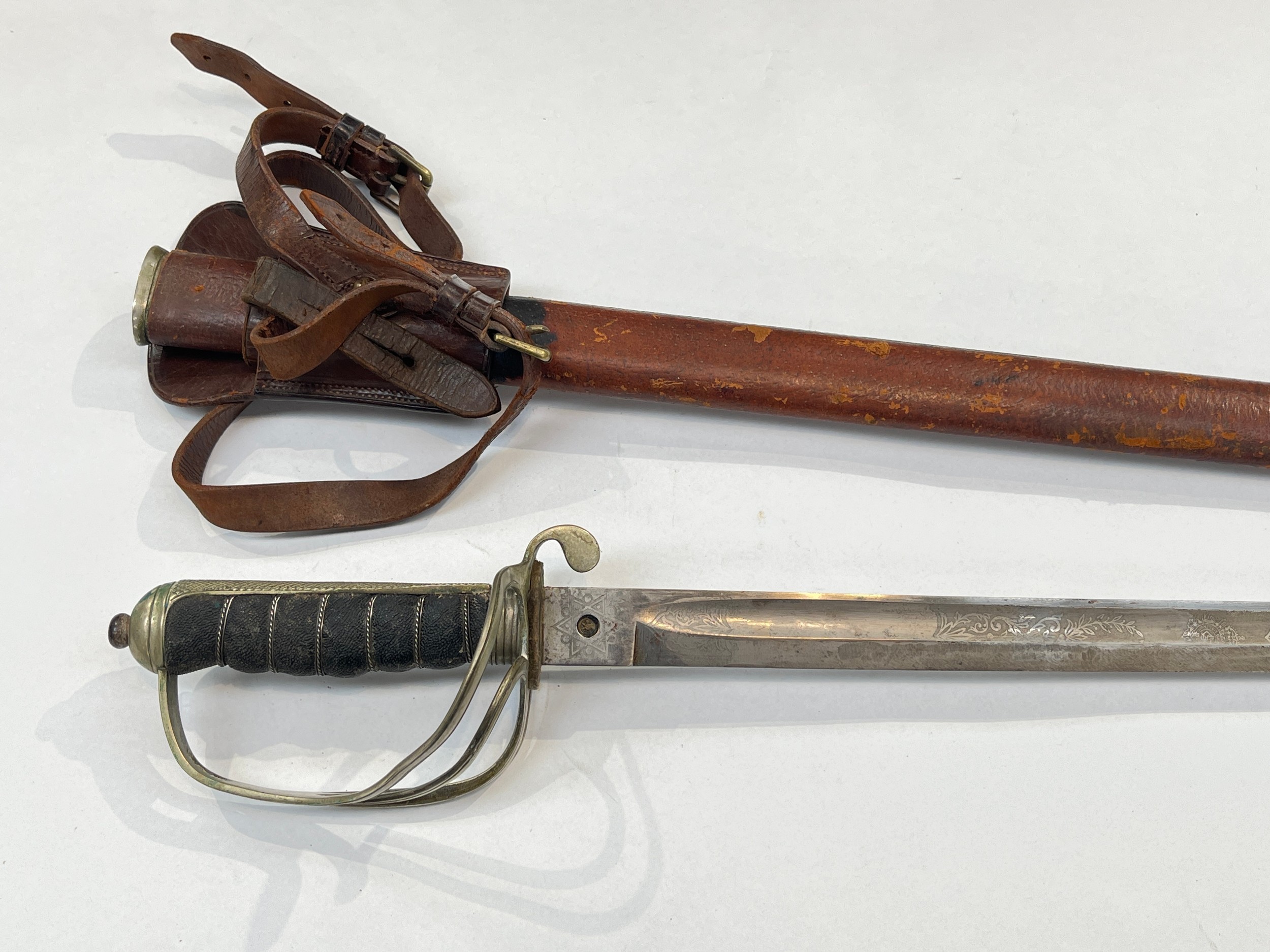 A George V 1821 pattern Royal Artillery officer's sword with leather field scabbard