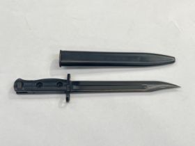 A British L1A3 bayonet dated 58, with scabbard