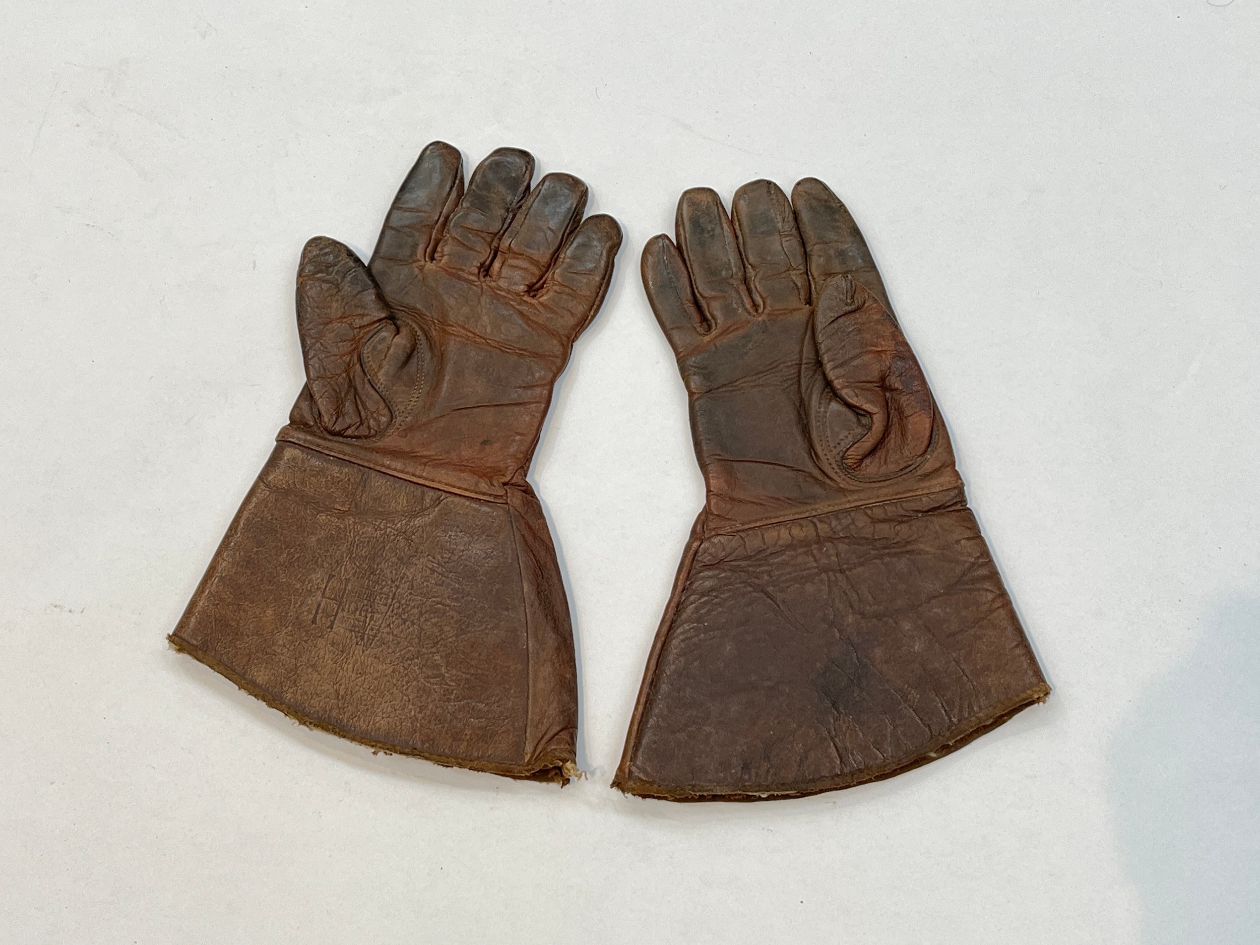 A pair of WWII era RAF hide leather flying gauntlets