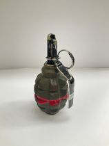 A Russian pineapple grenade, marked UZRGM. Deactivated