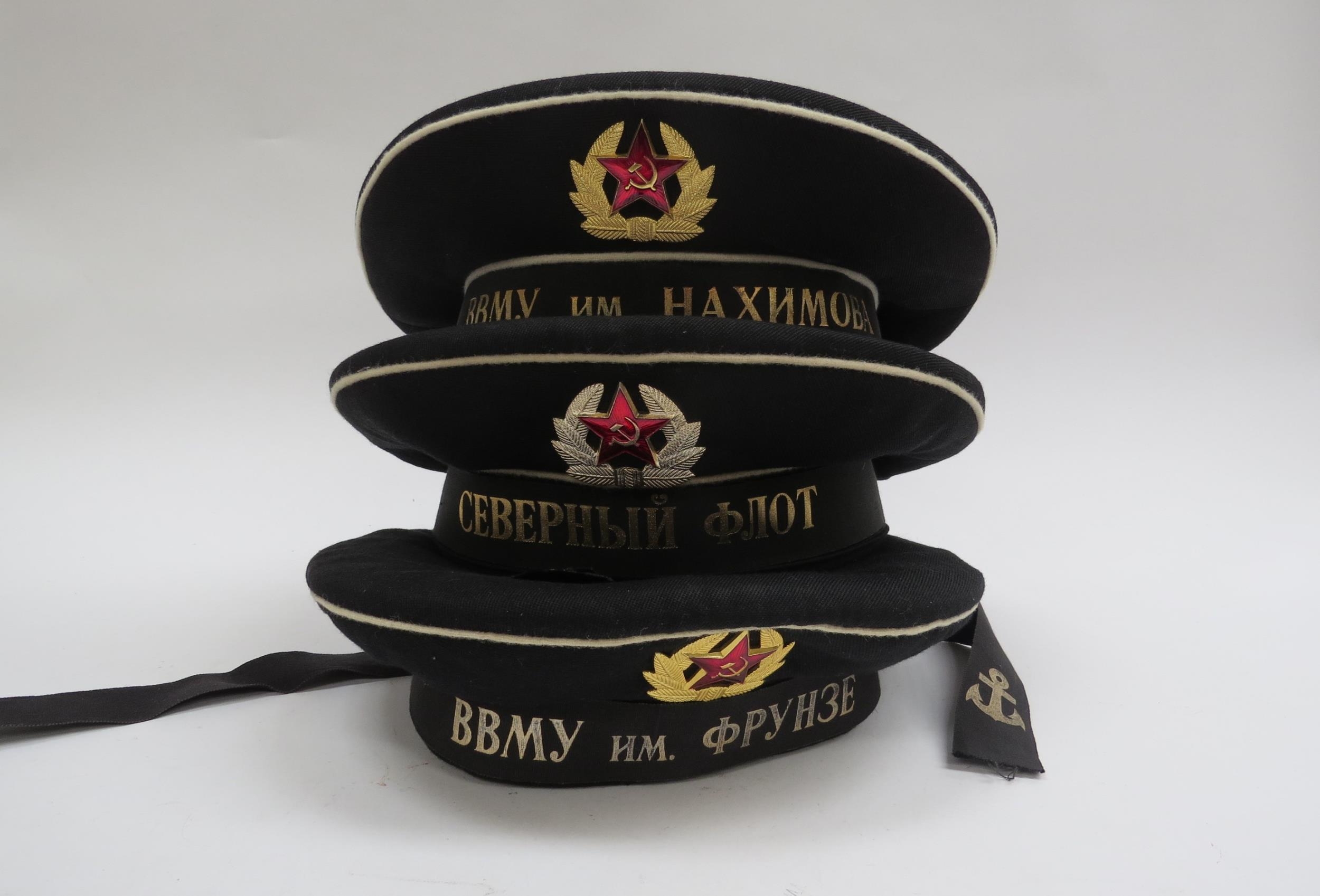 Three USSR Russian Soviet Navy sailor's caps, black with white piping, each with hammer and sickle