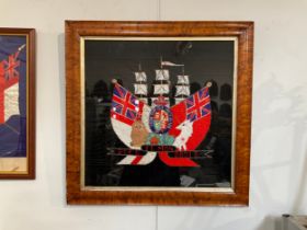 A silk embroidery of British coat of arms and Naval emblems including unicorn, lion and tall ship,