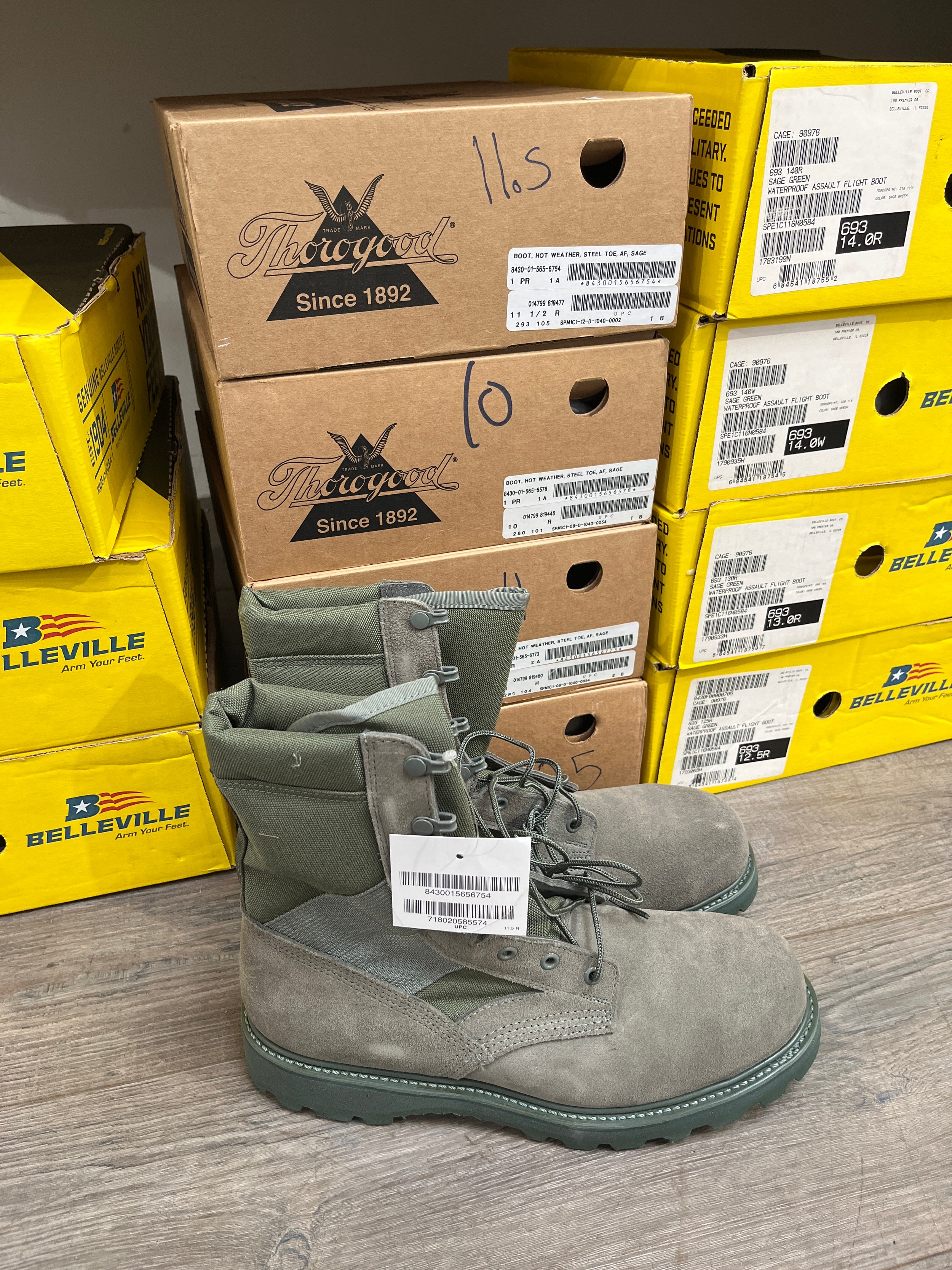 Four pairs of USAF current issue hot weather boots with steel toe caps, size 10, 10.5, 11 and 11.