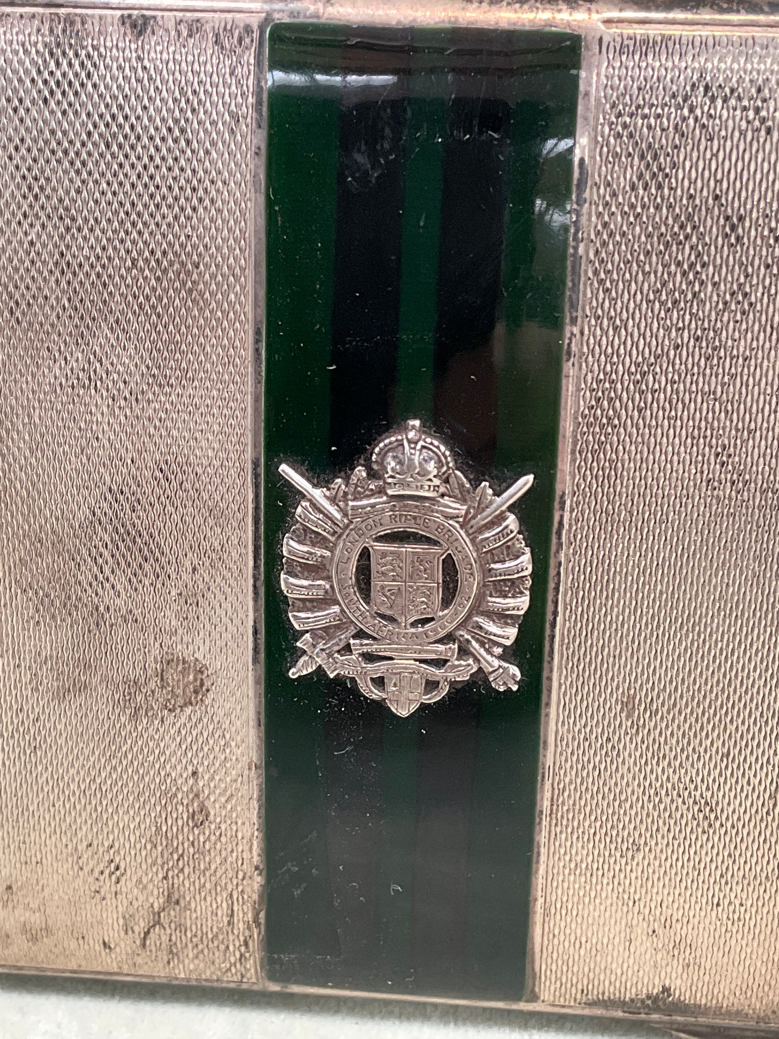 A silver compact with engine turned case, central green and black striped enamel detail with central - Image 2 of 3