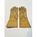 A pair of WWII British driver's leather gloves, maker marked Frank Bryan Ltd and dated 1943