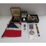 A quantity of militaria including National Service Medal, 1915 star trio miniatures etc