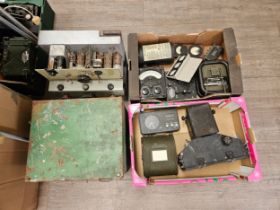 Various equipment including Avometer, loudspeaker and reconnaissance camera parts