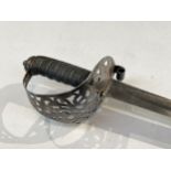 An 1892 Pattern Mark I Household Cavalry Troopers' sword, the pierced steel basket hilt with