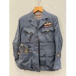 A WWII RAF 1943 dated Warrant Officer pilot's uniform consisting of jacket, trousers, side hat, C-