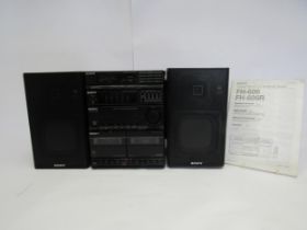 A Sony FH-606 component hi-fi system with detachable speakers c.1988, with instruction manual,